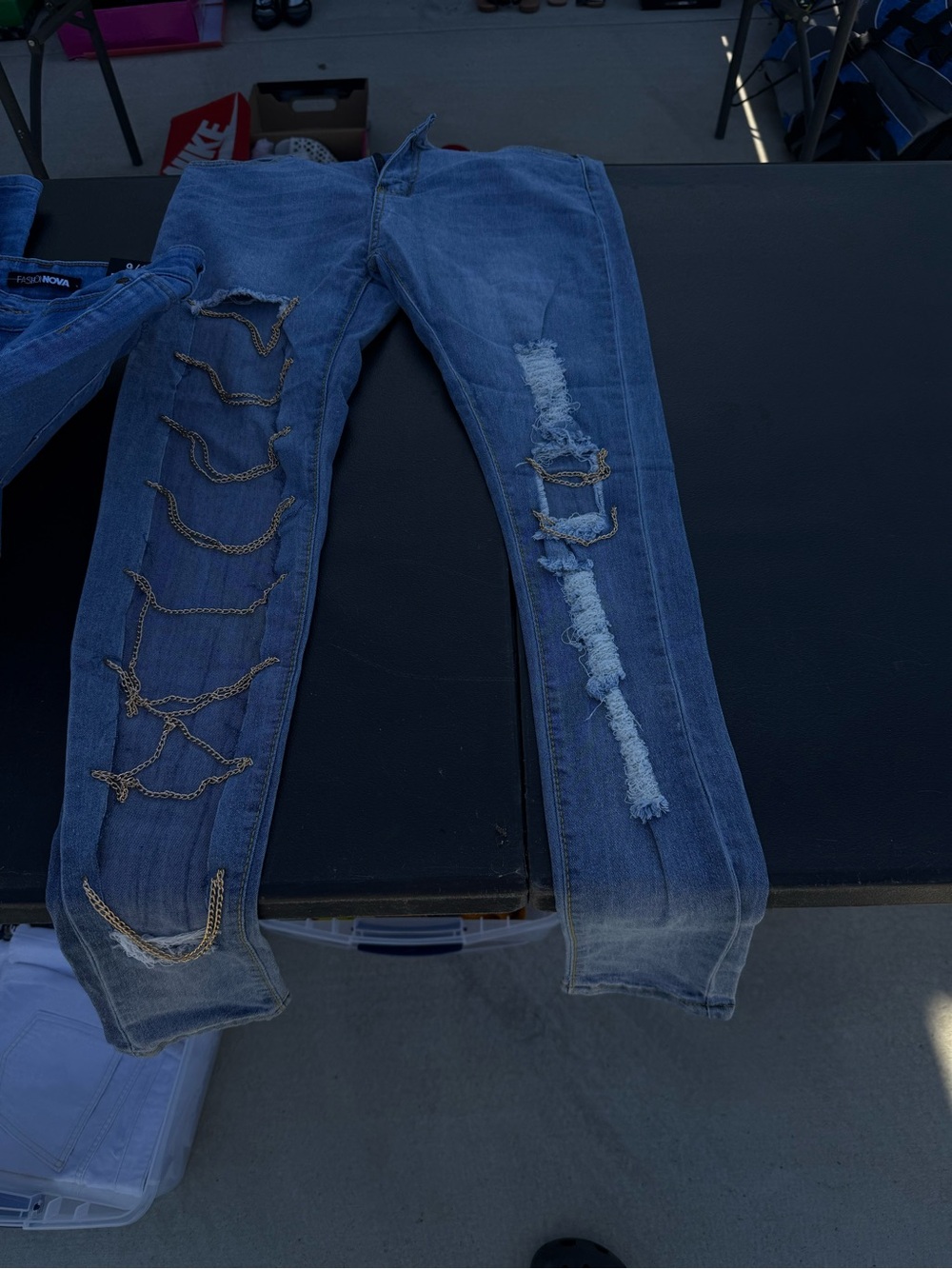 Distressed Blue Skinny Jeans with Chain Detail